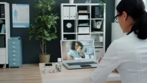 Doctor on a telemedicine video call representing a healthcare innovator
