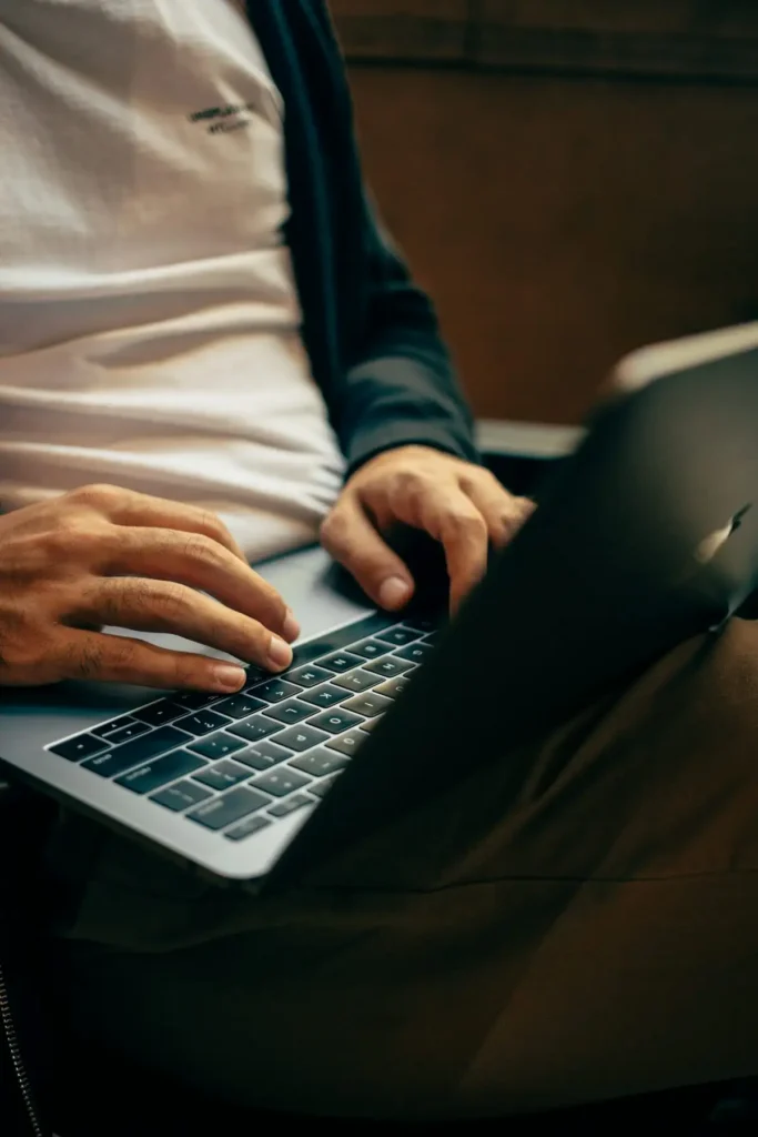 Entrepreneur working on a laptop preparing an award application