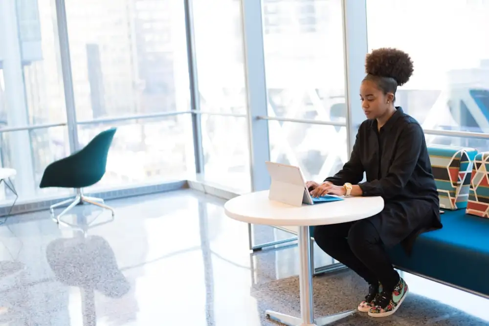 Entrepreneur working on a laptop in a modern office
